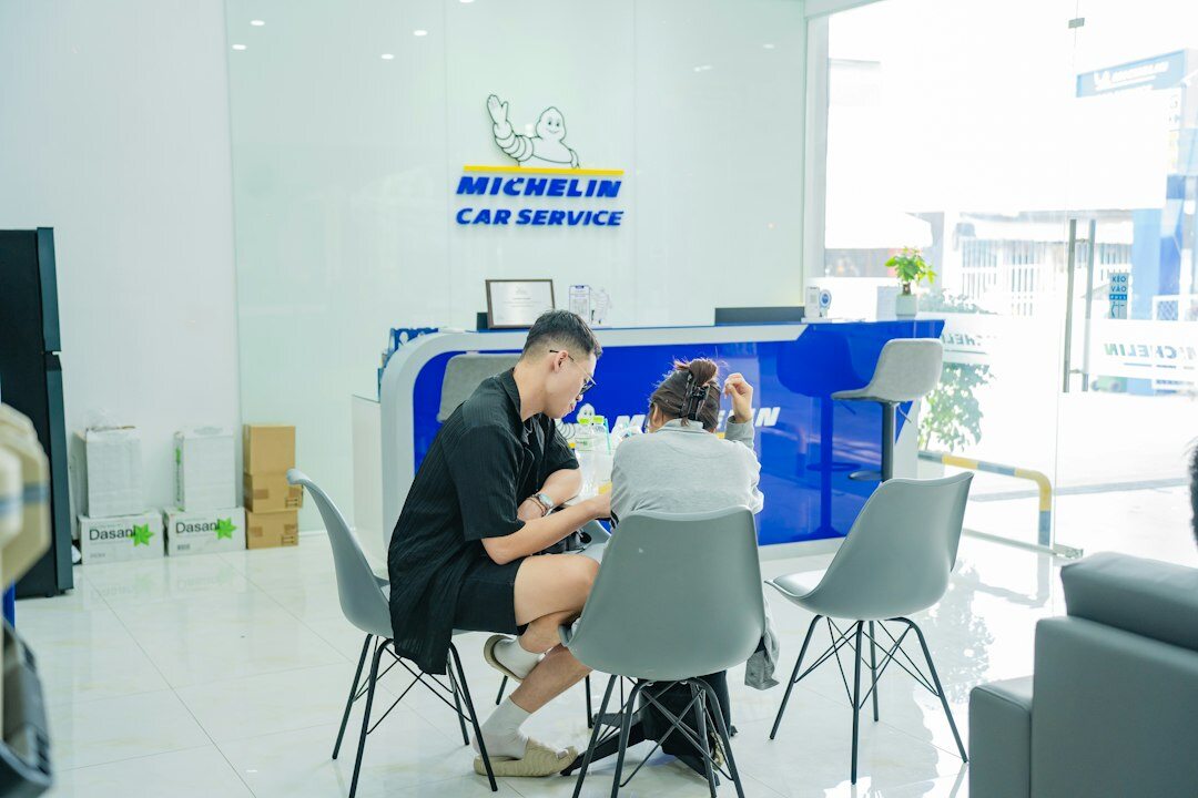 Modern finance office with employees reviewing car rental contracts