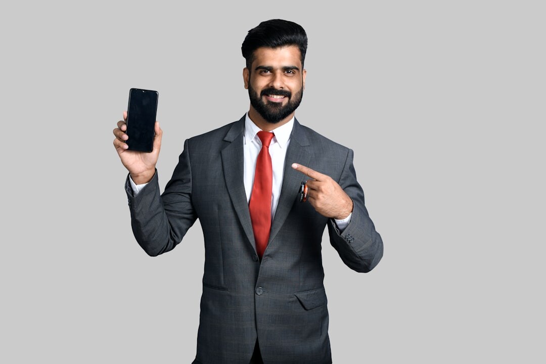 Studio portrait of a smiling finance advisor man