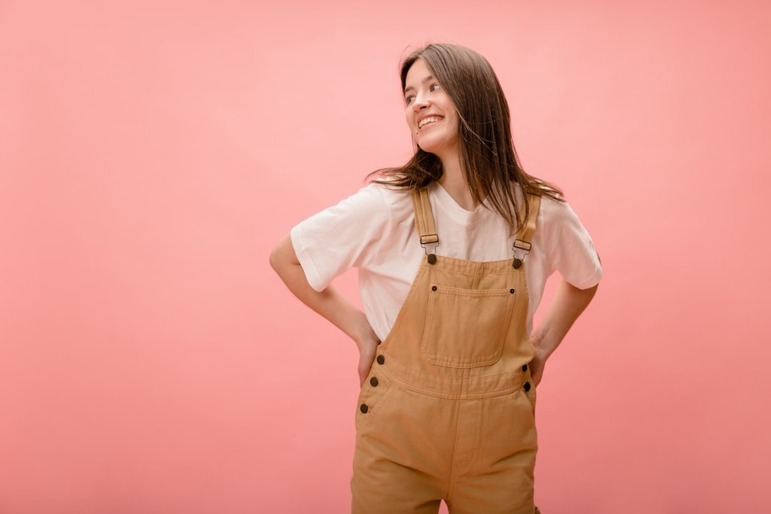 Studio portrait of a smiling operations manager woman