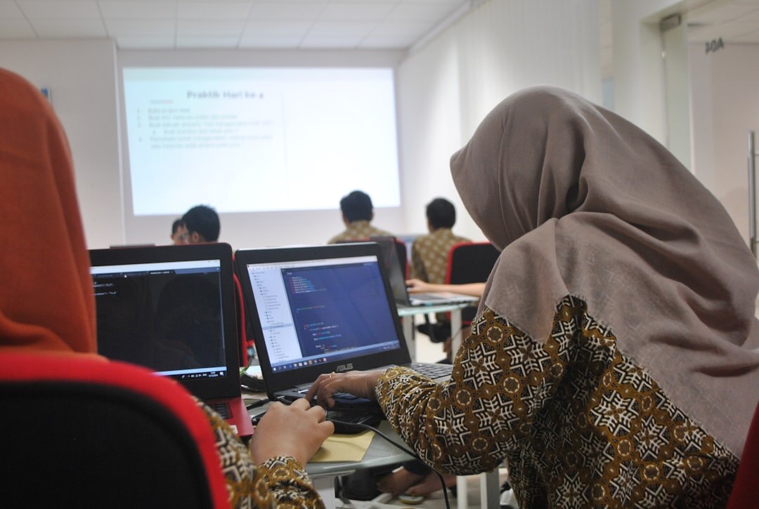 students learning coding in english class