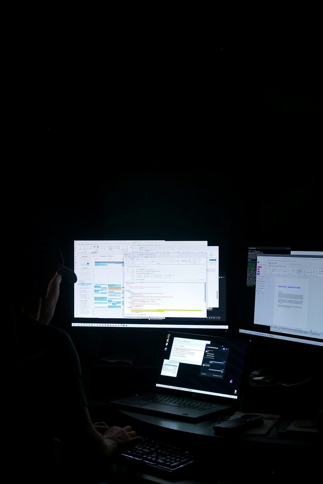 person coding at night