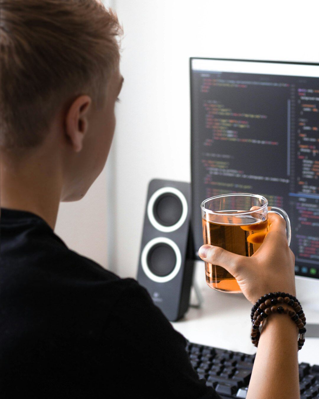 programmer solving puzzle on screen