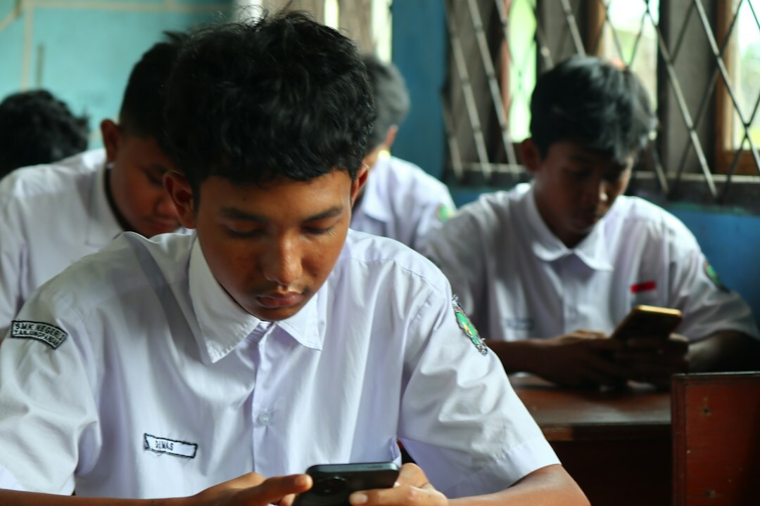 students coding together in classroom
